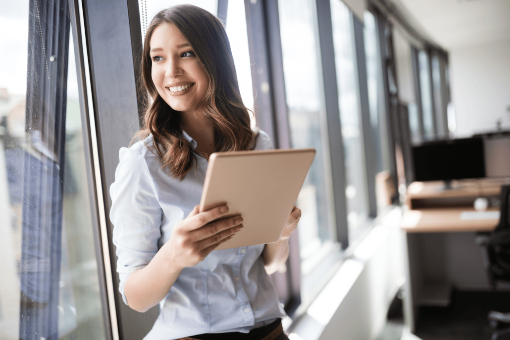 Lady in an office using an iPad